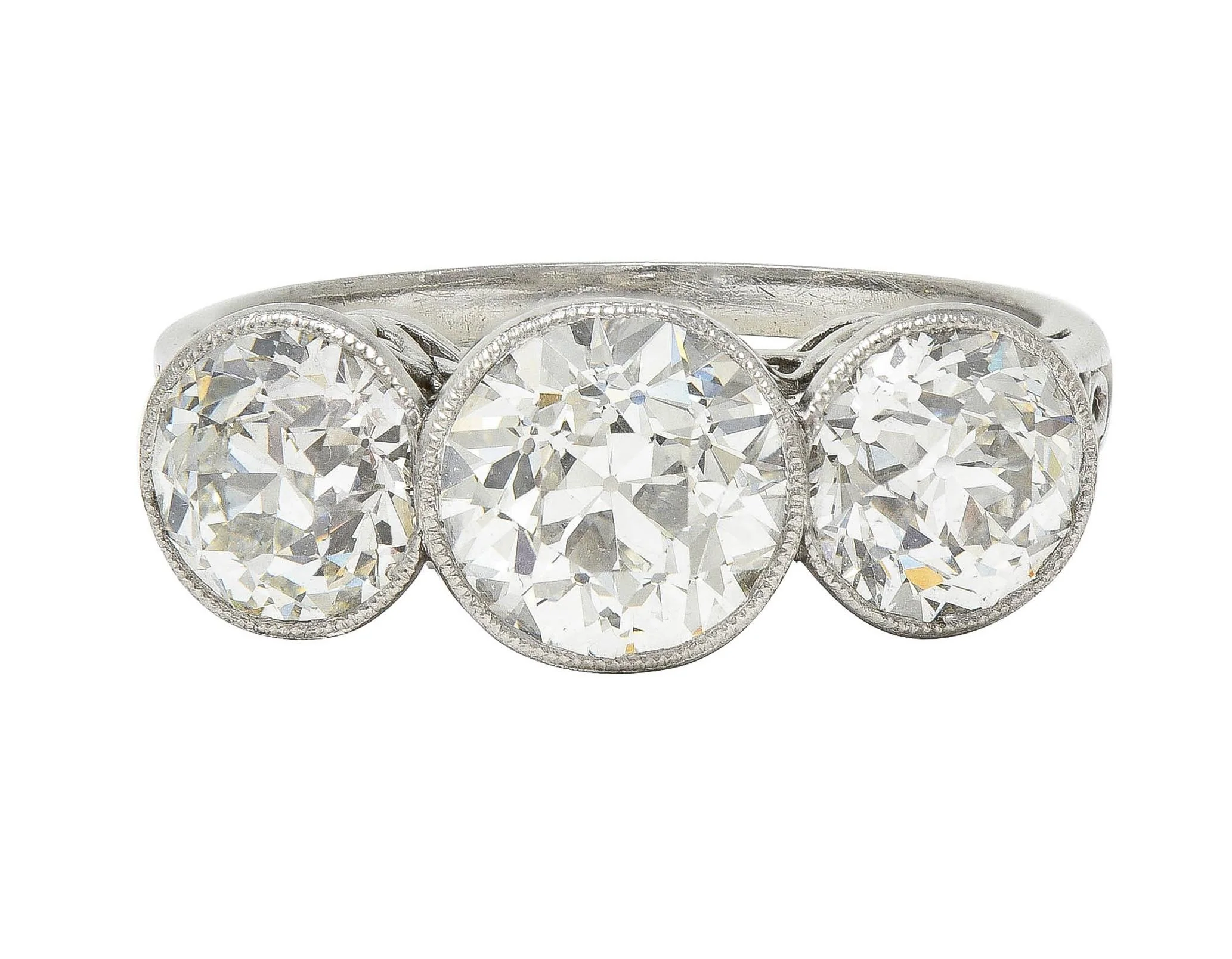 Edwardian 3.10 CTW Old Mine Cut Diamond Platinum Antique Three Stone Ring