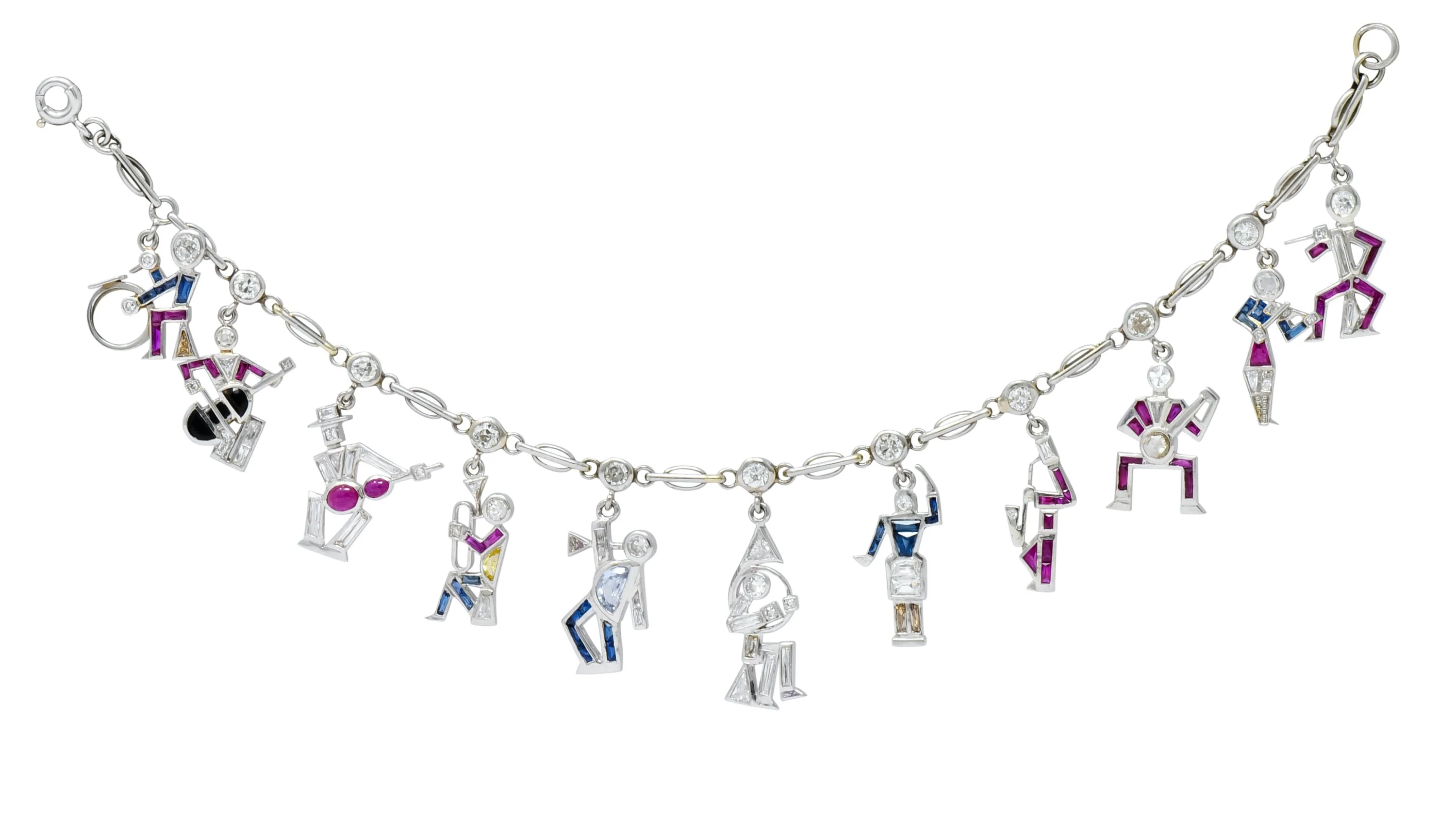 Retro Diamond Ruby Sapphire Platinum Jazz Band Musical Charm Bracelet Circa 1940s